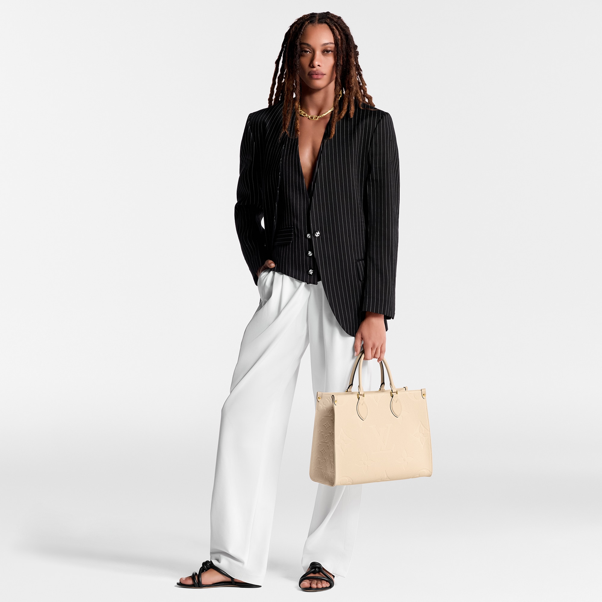 OnTheGo MM Monogram Empreinte Leather | LOUIS VUITTON ®